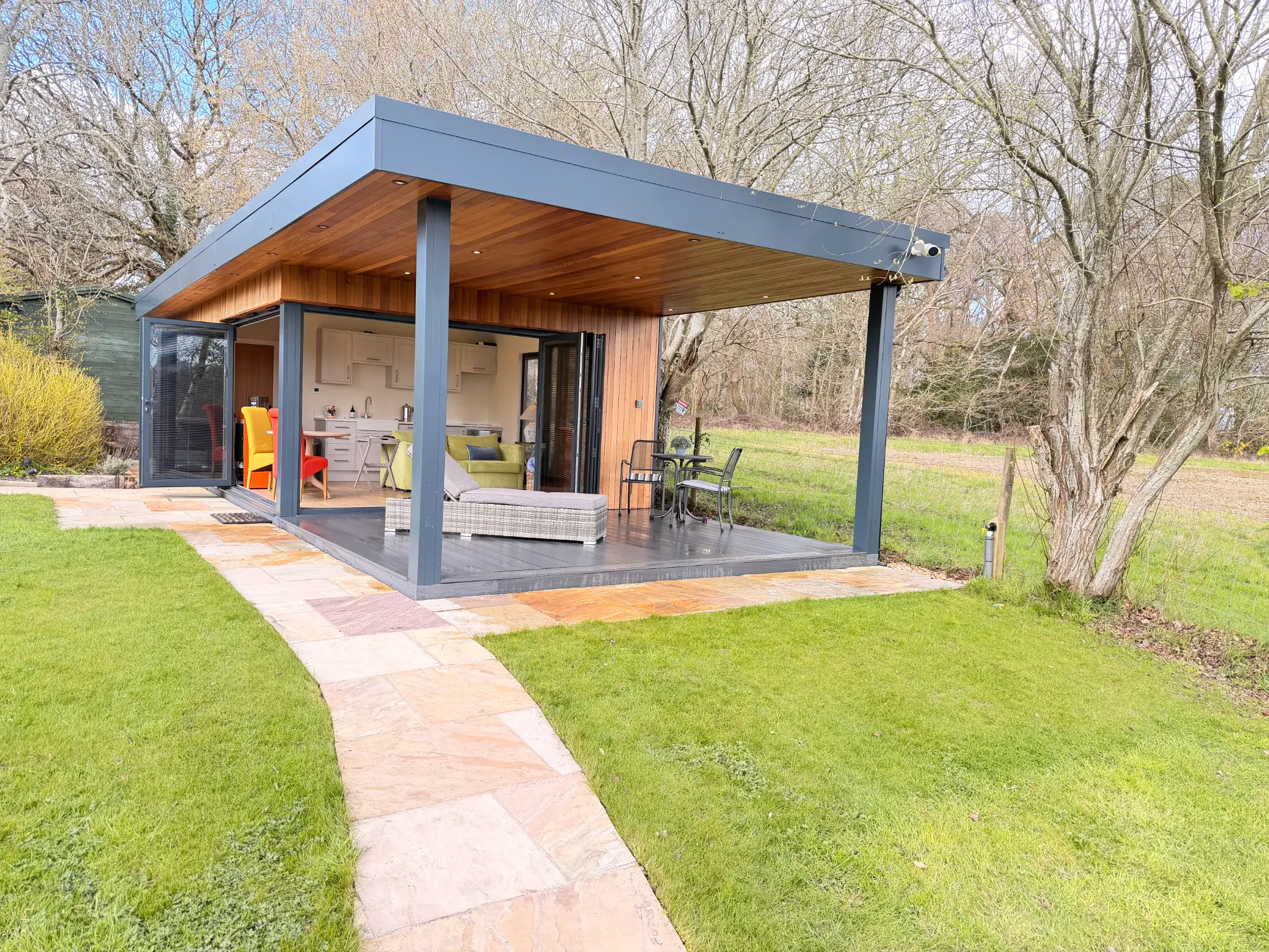 The View exterior — cedar and anthracite steel architecture